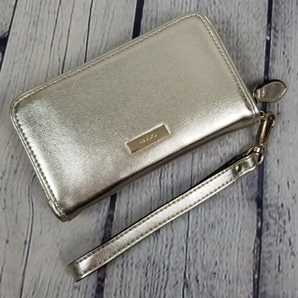 ALDO | metallic gold zip close wrist strap wallet